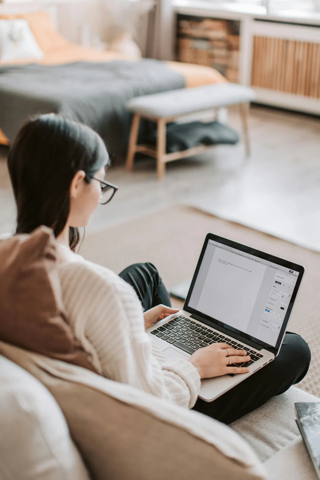 Person drafting written content at a desk